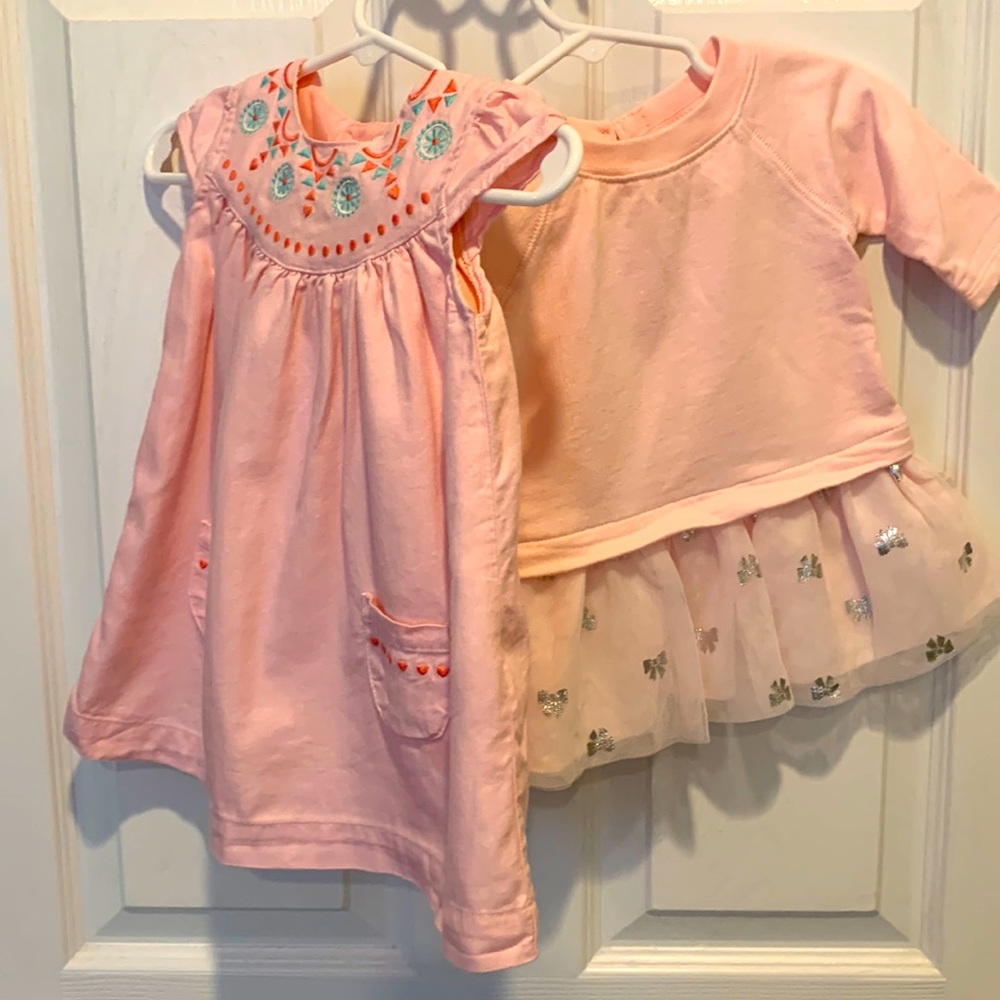 Two pink Carter’s dresses